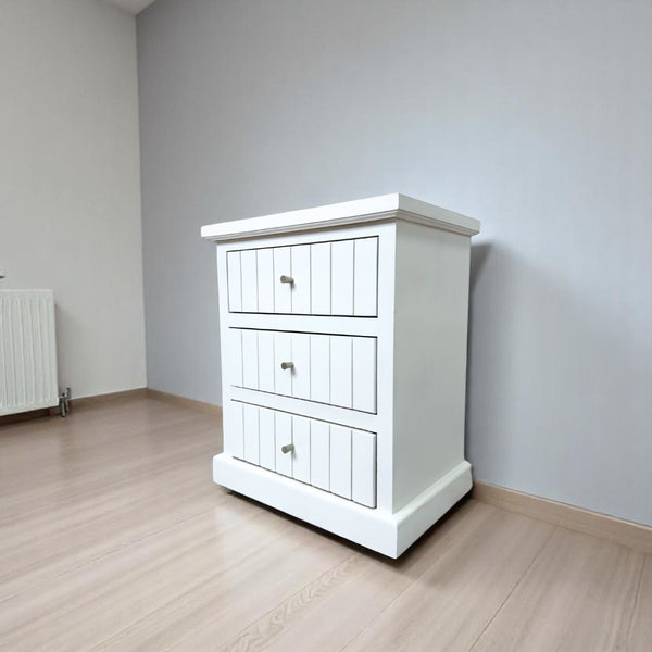 Vista lateral del velador Aval Ranurado con diseño ranurado y cajones de almacenamiento