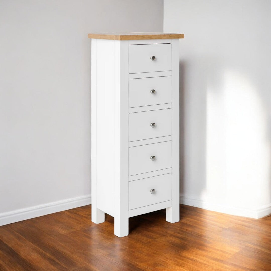 Vista lateral de cómoda de 5 cajones estilo minimalista en madera de pino
