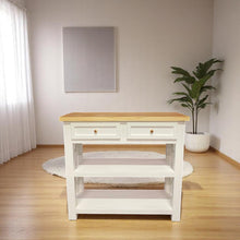 Vista frontal de mesa de arrimo blanca con 2 cajones y estante inferior

